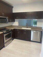 9967 NW 56th Pl in Coral Springs, FL - Building Photo - Building Photo