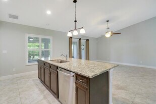 242 SW S Quick Cir in Port St. Lucie, FL - Building Photo