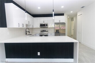 843 Duplex St E, Unit A in Lehigh Acres, FL - Building Photo - Building Photo