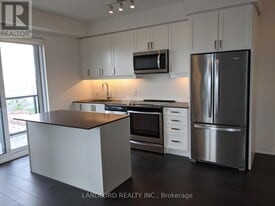 8 Nahani Way in Mississauga, ON - Building Photo