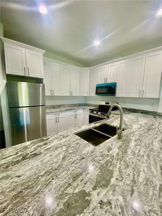 5427 Centennial Blvd in Lehigh Acres, FL - Foto de edificio - Building Photo