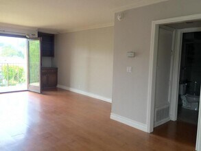 11675 Darlington Ave in Los Angeles, CA - Building Photo - Building Photo