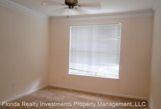 12825 Madison Pointe Cir-Unit -4-206 in Orlando, FL - Building Photo - Building Photo