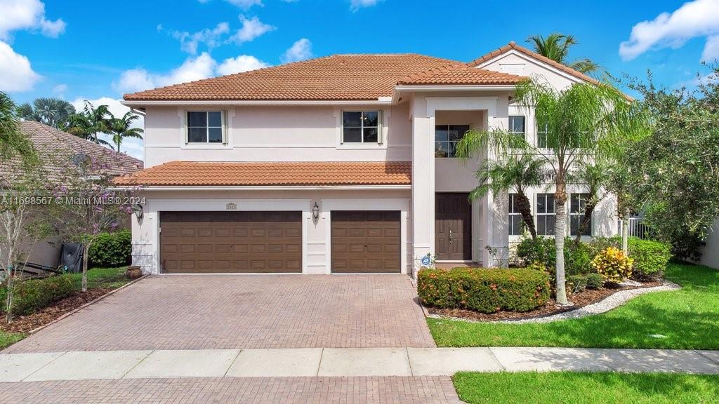 1665 Osprey Bend in Weston, FL - Foto de edificio