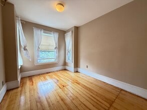 57 Rindge Ave, Unit 1 in Cambridge, MA - Building Photo - Building Photo