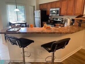 2205 S Cypress Bend Dr in Pompano Beach, FL - Building Photo - Building Photo