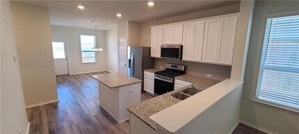 640 Pepperbark Loop in Mustang Ridge, TX - Building Photo - Building Photo