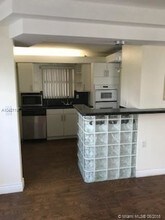 121 Golden Isles Dr-Unit -307 in Hallandale Beach, FL - Building Photo - Building Photo