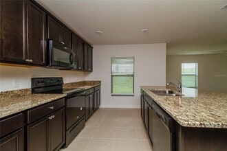 1980 Piedmont Ct in Mascotte, FL - Building Photo - Building Photo