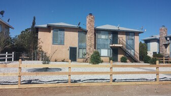 18140-46 Poinciana in Adelanto, CA - Building Photo