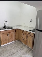 Efficiency in Lehigh ALL UTILITIES INCLUDED!!! in Lehigh Acres, FL - Foto de edificio - Building Photo