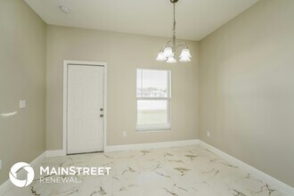 2411 Claude Ave N in Lehigh Acres, FL - Building Photo - Building Photo