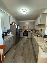 15700 E Jamison Dr, Unit 8-308 in Englewood, CO - Foto de edificio - Building Photo