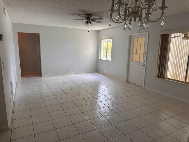 3561 Tall Pine Way in Greenacres, FL - Building Photo - Building Photo