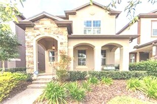 7112 Enchanted Lake Dr in Winter Garden, FL - Building Photo