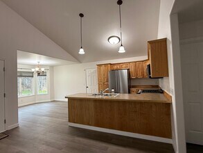 20510 Wooded Hollow Cir in Chugiak, AK - Building Photo - Building Photo