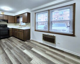 8532 W Gregory St, Unit 8532-1N in Chicago, IL - Building Photo - Building Photo