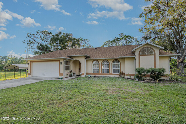 2980 Westside Ave in Palm Bay, FL - Foto de edificio - Building Photo