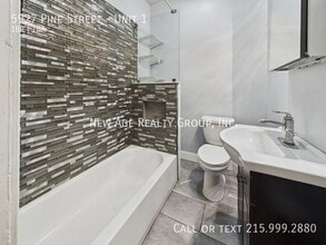 5927 Pine St, Unit Unit 1 in Philadelphia, PA - Foto de edificio - Building Photo