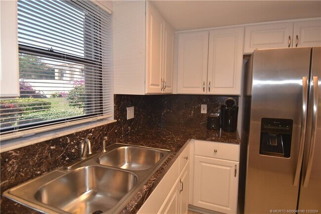 property at 301 SW South River Dr