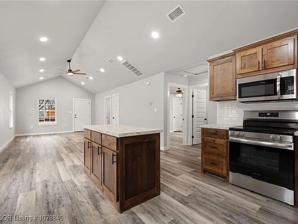 209 Coggins Ave in Poteau, OK - Building Photo