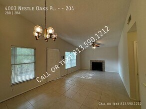 4003 Nestle Oaks Pl-Unit -204 in Tampa, FL - Building Photo - Building Photo