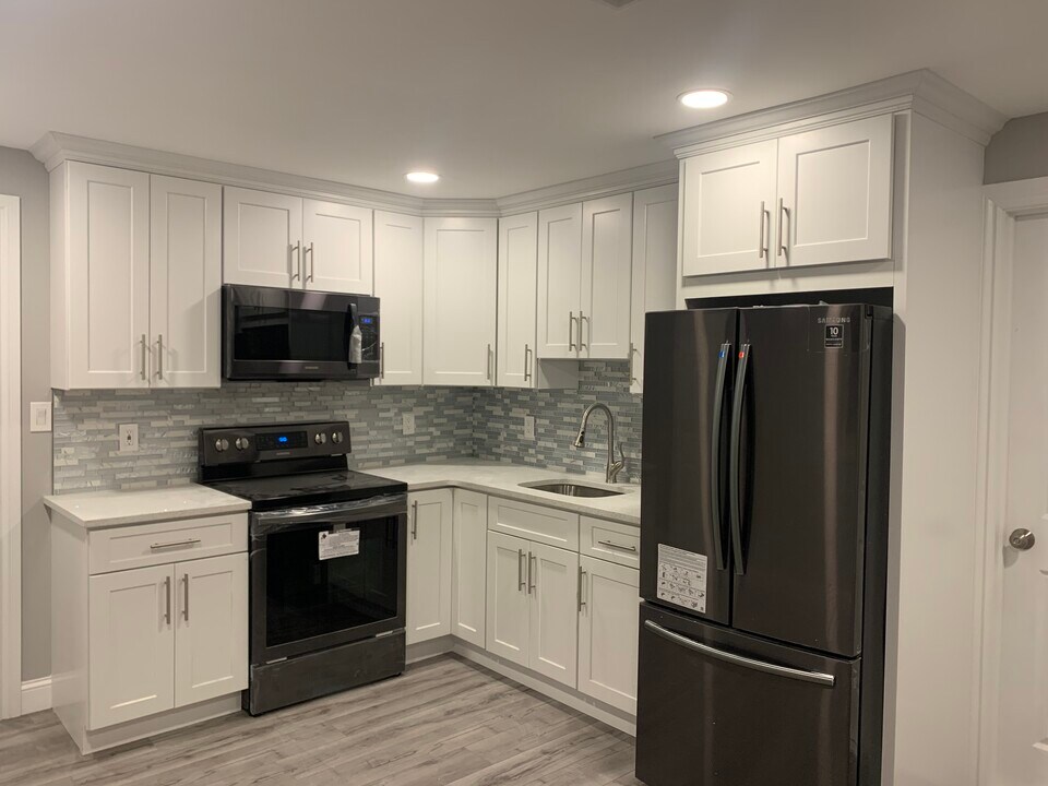 49 Hilliard Ave, Unit 1 in Central Islip, NY - Building Photo