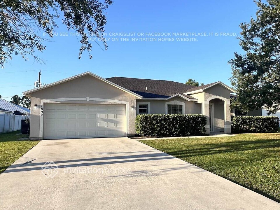 1890 SW Effland Ave in Port St. Lucie, FL - Building Photo