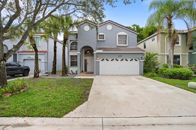 property at 11777 NW 1st St