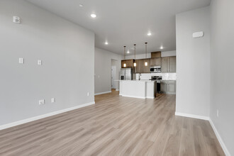 6153 N Ceylon St, Unit 2-106 in Denver, CO - Building Photo - Building Photo