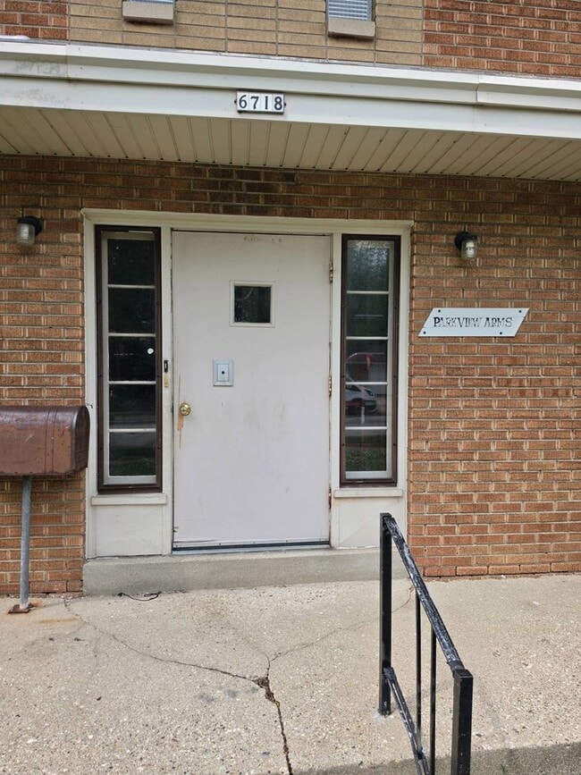 property at 6718 W Warnimont Ave