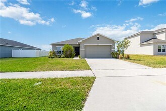 212 Aquamarine Ln in Kissimmee, FL - Foto de edificio - Building Photo