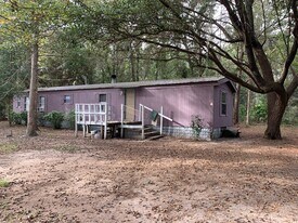 93 Whispering Pines Cir in Allenhurst, GA - Building Photo