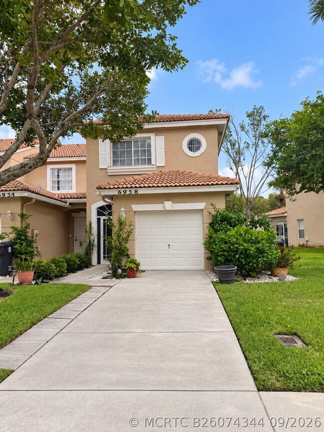 property at 6958 Oak Bridge Ln