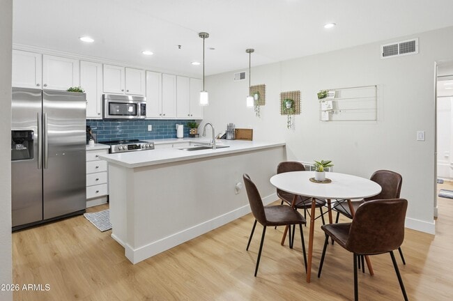 property at 4704 E Paradise Village Pkwy N