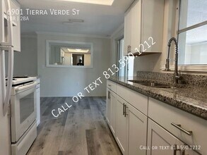 6901 Tierra Verde St in Port Richey, FL - Building Photo - Building Photo
