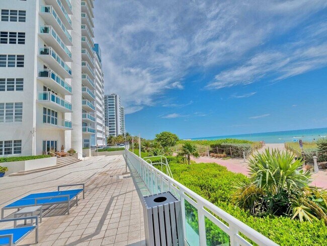 property at 6917 Collins Ave