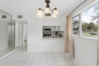 8027 Lagos De Campo Blvd in Tamarac, FL - Building Photo - Building Photo