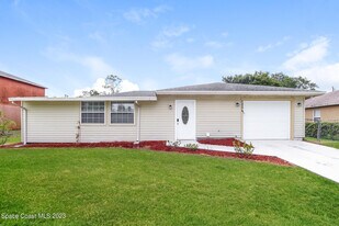 1054 Fairplay Ave NW in Palm Bay, FL - Building Photo