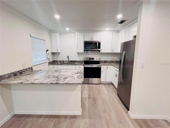 5800 Virginia Ave in New Port Richey, FL - Building Photo - Building Photo
