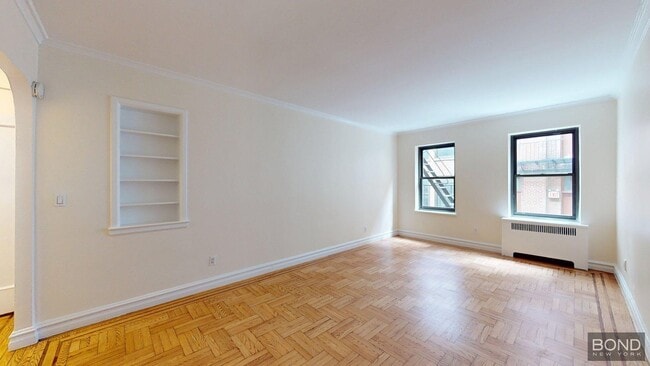 property at 124 E 24th St