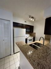 2881 N Oakland Forest Dr, Unit 208 in Oakland Park, FL - Building Photo - Building Photo