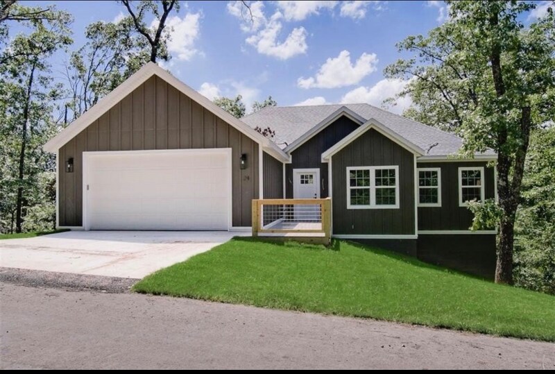 24 S Cheshnut Dr in Bella Vista, AR - Foto de edificio