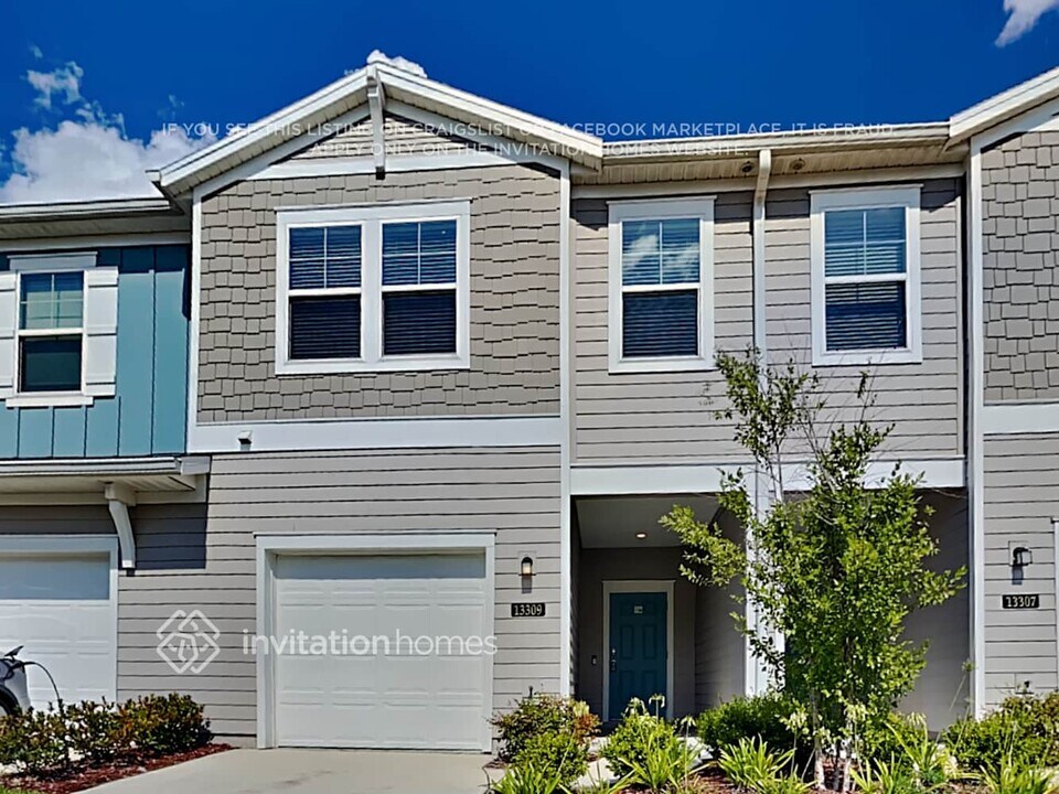 13309 Shore Grass Dr in Jacksonville, FL - Building Photo