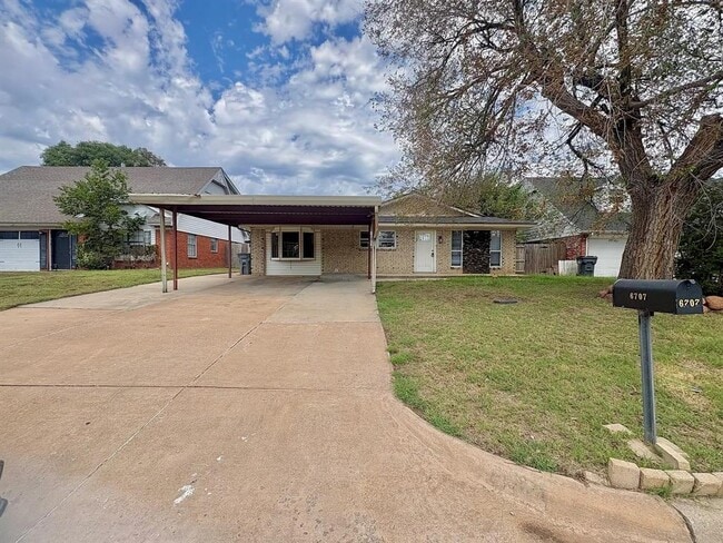 property at 6707 NW Compass Dr