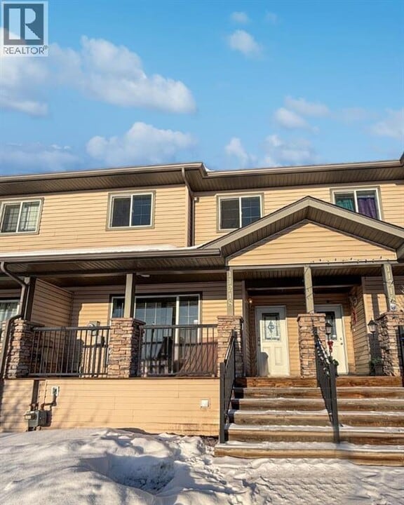 11218-11269 69 Ave in Grande Prairie, AB - Building Photo