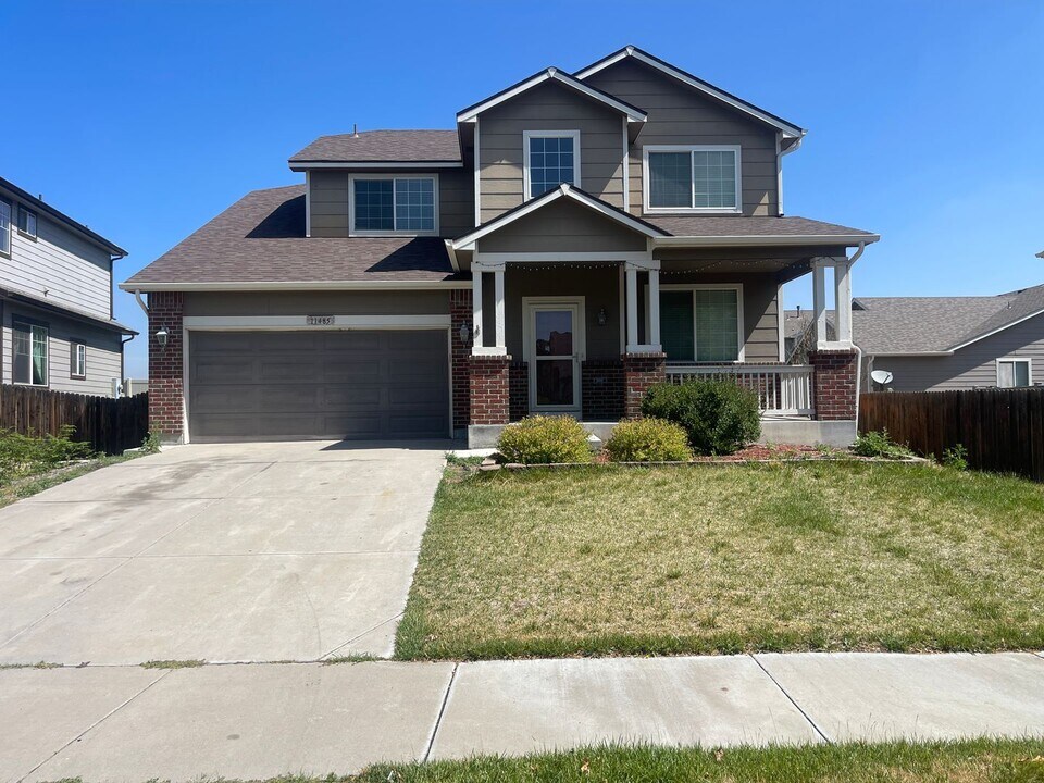 11485 Iola St in Henderson, CO - Building Photo
