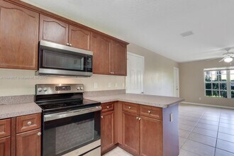 3812 Dove Landing Rd-Unit -13 in Lake Park, FL - Building Photo - Building Photo