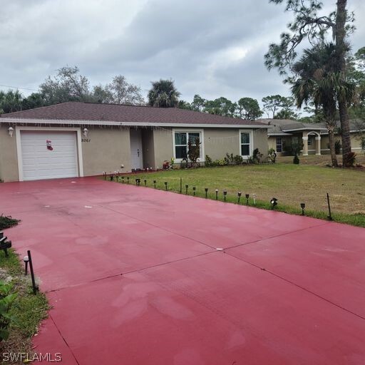 8061 Windswept Cir in La Belle, FL - Building Photo