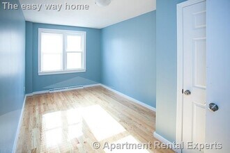 173 Rindge Ave, Unit #1R in Cambridge, MA - Foto de edificio - Building Photo